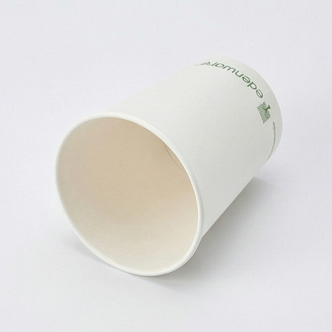 12oz compostable white single wall paper cup - tilted angle showing interior of open cup on white background