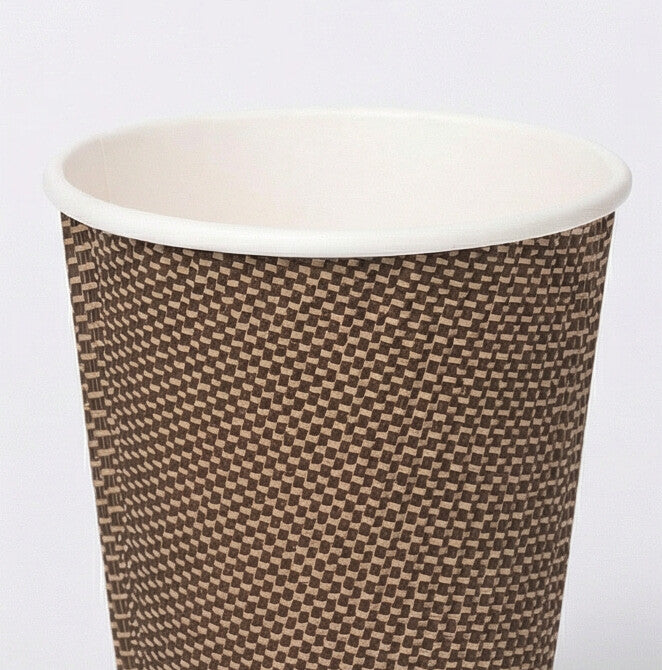 Close-up of the white rolled rim and woven texture of a 12oz VIP Ripple Wall Paper Cup, light grey background