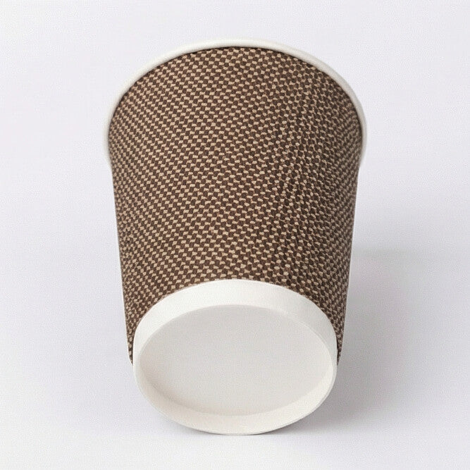 12oz VIP ripple wall paper cup tilted back to show the base ring and base circle, woven exterior on light grey