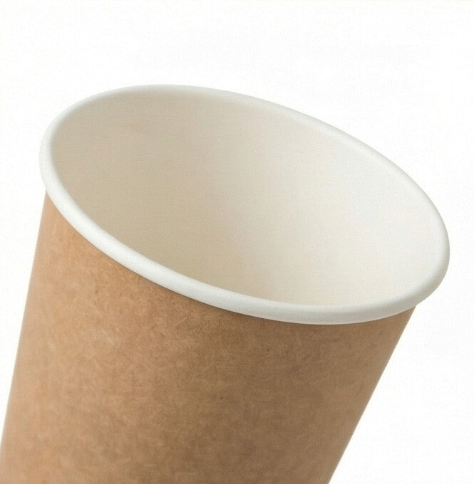 16oz compostable kraft double wall paper cup - tilted top-down view showing open interior on white background