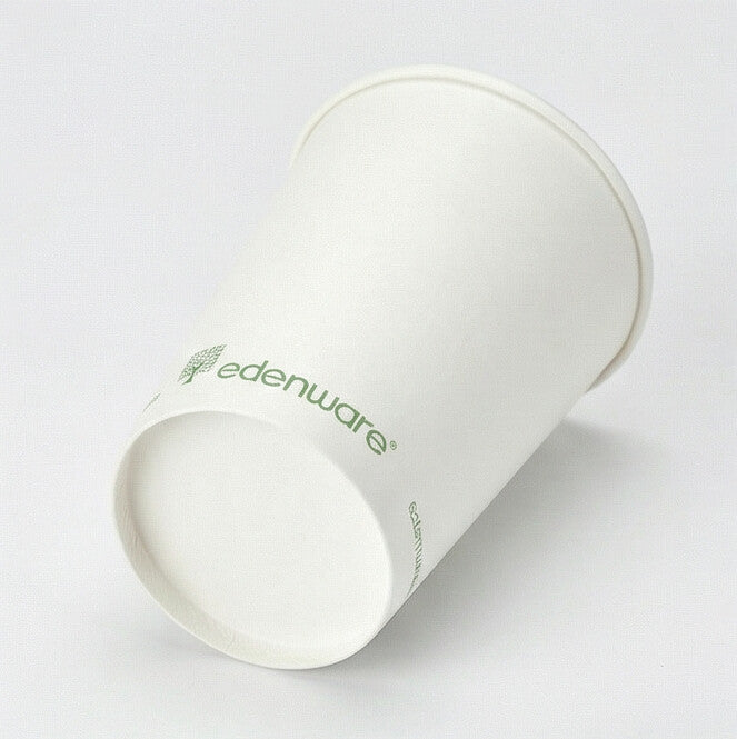 16oz compostable white single wall paper cup - tilted side angle on white background