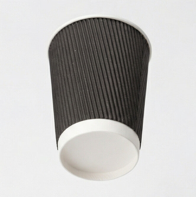 16oz Black Ripple Wall Paper Cup from three-quarter above, showing the open interior and black ripple exterior on grey