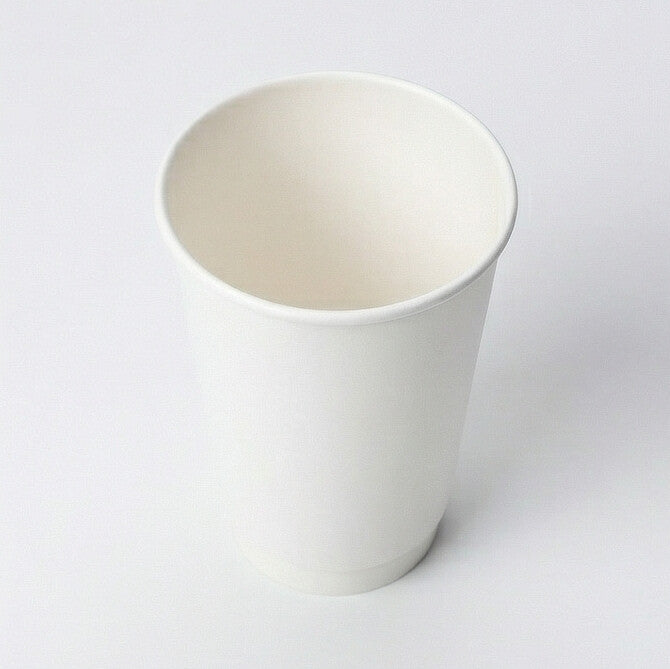 16oz White Double Wall Paper Cup from three-quarter above, showing the open interior and smooth white body on light grey