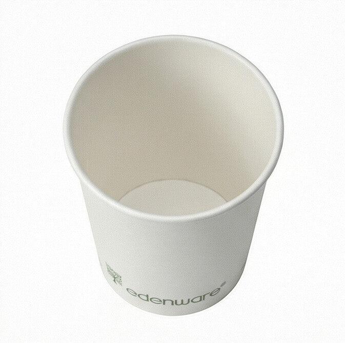 Three-quarter above view of an empty 4oz White Compostable Single Wall Paper Cup showing interior and edenware branding