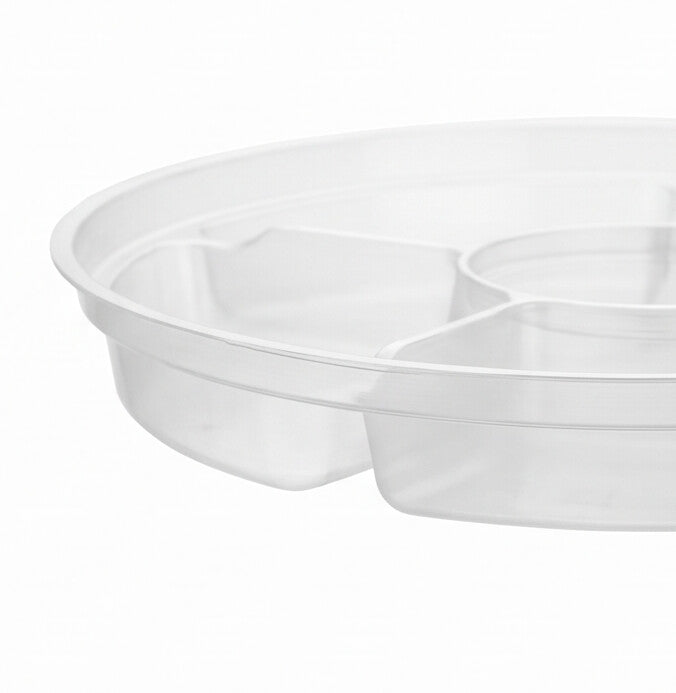 Clear round 6-compartment insert viewed from a low angle, emphasizing the depth of the wedge compartments and the dividing walls.