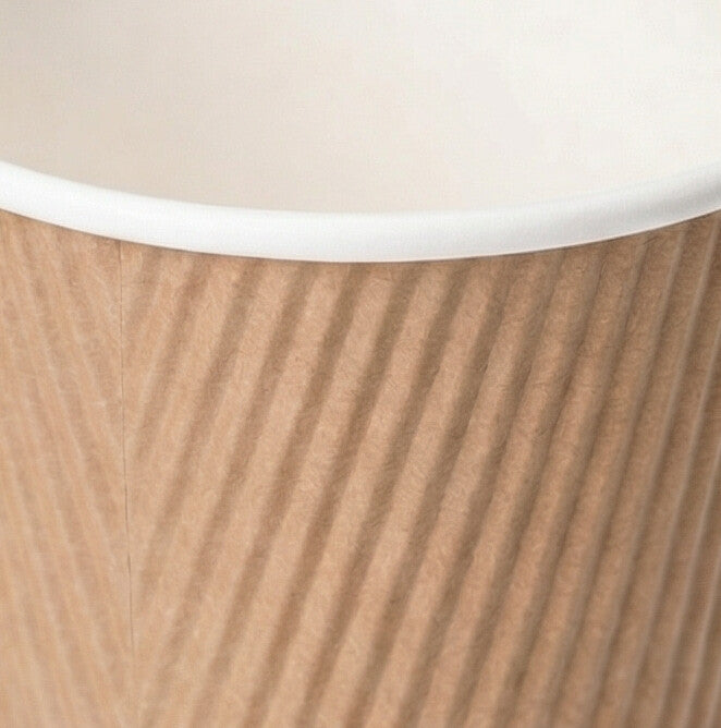 Close-up of the white rim and kraft herringbone ripple exterior of an 8oz ripple wall paper cup, shot from the front