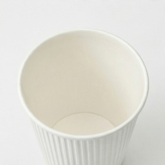 Overhead view into the open interior of an 8oz White Ripple Wall Paper Cup, smooth inner wall, ripple exterior