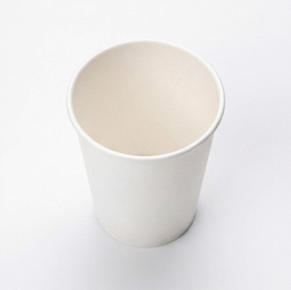 White 8oz paper cup shot from a slightly elevated front angle, showing the interior rim and tapered body on white background