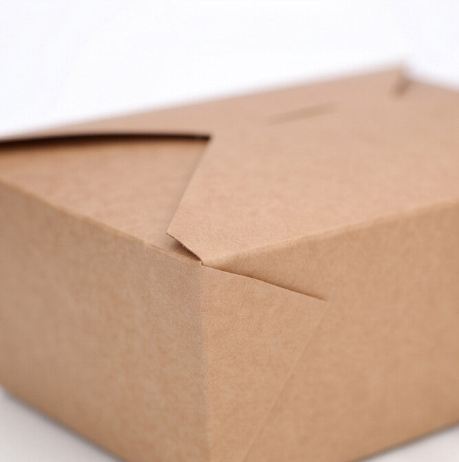 Close-up detail of kraft paper takeaway food container No. 4, showing fold-over flap and corner construction