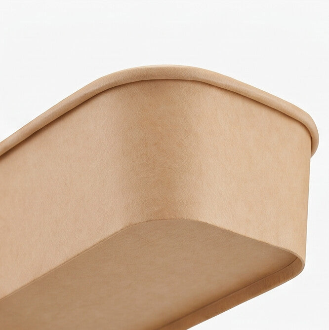 Close-up of the smooth interior wall and base of a kraft rectangular paper bowl 750ml, showing the food-grade paper lining.