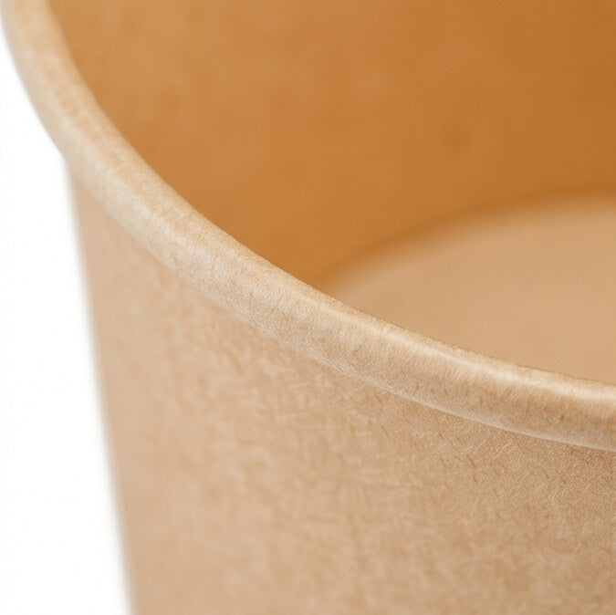 Close-up of the rolled rim and interior of a kraft paper soup bowl 42oz, highlighting the smooth food-grade lining and kraft paper grain.