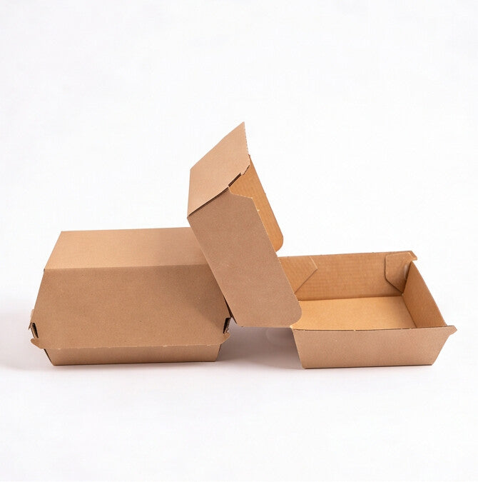Medium corrugated burger boxes styled group view showing one closed box and one open with lid raised, natural kraft brown corrugated construction on white background