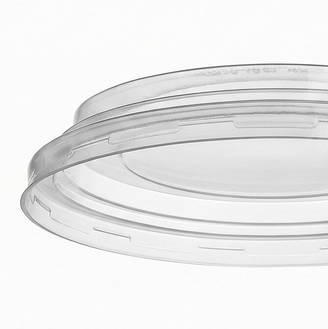 Close-up detail of the transparent dome edge of a clear 150mm PET lid, showing the snap-fit locking tabs and crystal-clear PET material