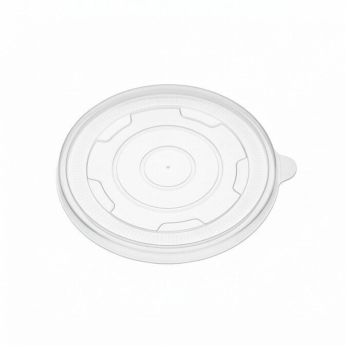 Clear PP lid 112mm, low perspective view showing top surface profile, concentric ring pattern and rim detail

