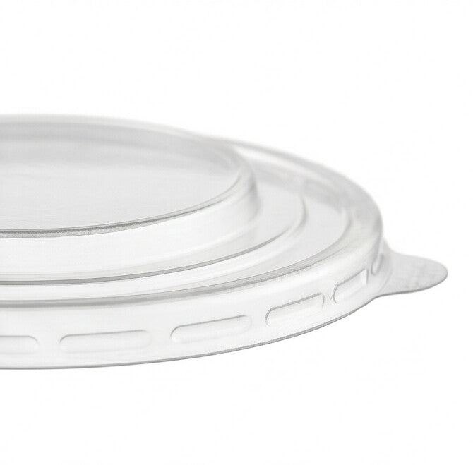 Close-up detail of the pull tab and ribbed locking rim of a 183mm PP lid, showing the clean transparent finish