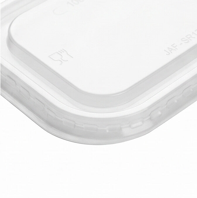 Close-up of the ribbed snap-fit locking rim and food-safe icon on the corner of a clear PP rectangular lid