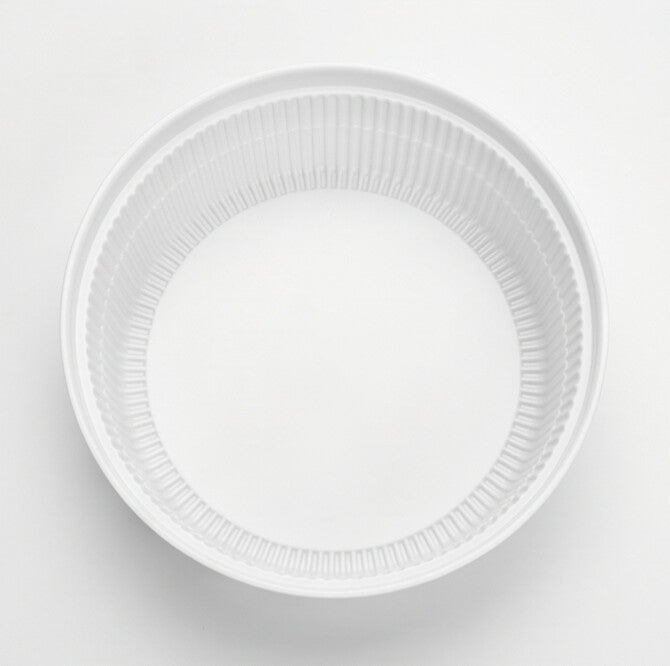 Clear ribbed PP soup bowl insert viewed from directly above, showing the fluted base with PP recycling symbol and microwave-safe icon.