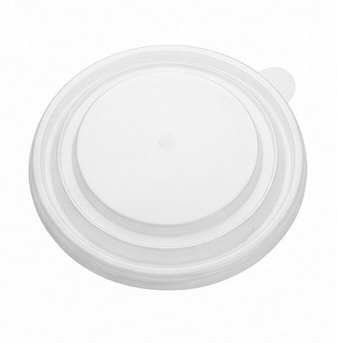 Clear PP soup bowl lid 140mm shown at a three-quarter angle, highlighting the low domed top and grip pull tab.