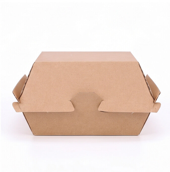 Small corrugated burger box closed, straight front view showing natural kraft brown corrugated construction and locking tab closure on white background