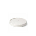 White paper vented lid 90mm shown at a three-quarter angle resting on a container, displaying the four vent holes and flat paper top.