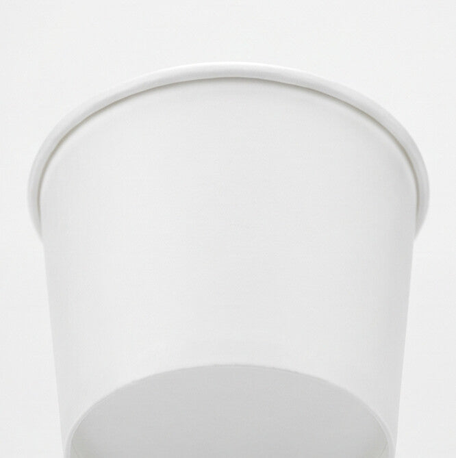 close-up of the wide mouth and rolled rim of a white paper soup bowl 54oz, showing the smooth interior.
