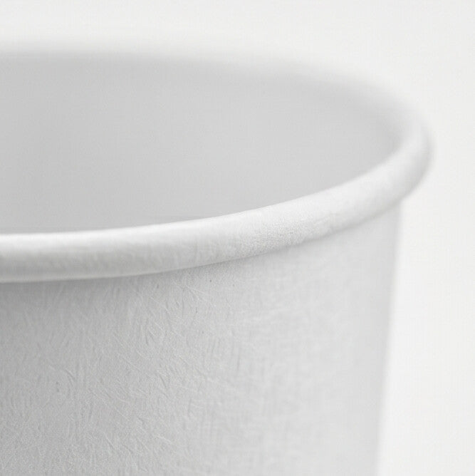 Close-up of the rolled rim and interior of a white paper soup container 12oz, highlighting the smooth food-grade coated surface.