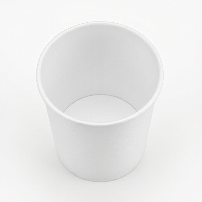 White paper soup container 12oz shown at a three-quarter angle, revealing the interior, rolled rim and tapered sidewall