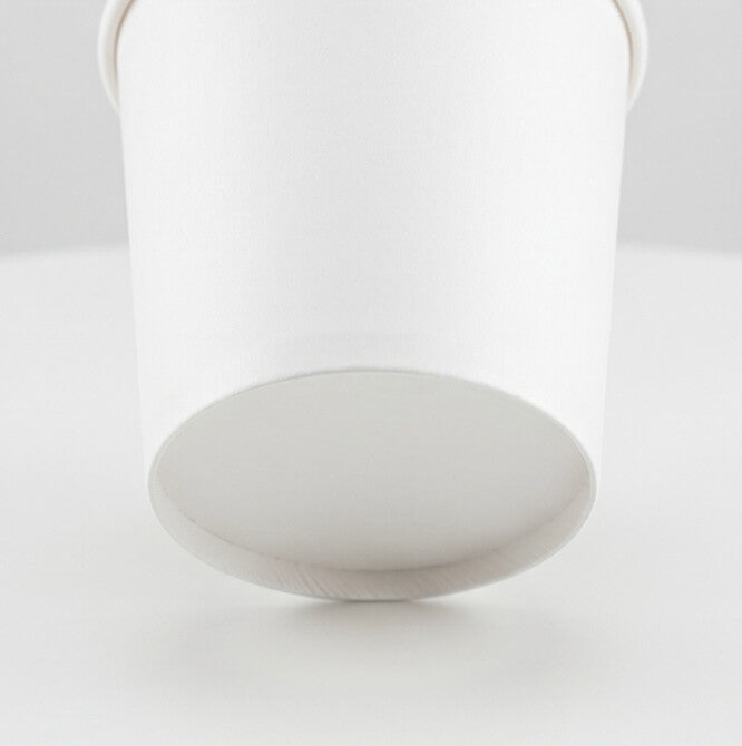 White paper soup container 26oz viewed from a low angle, highlighting the base, sidewall and rolled rim.
